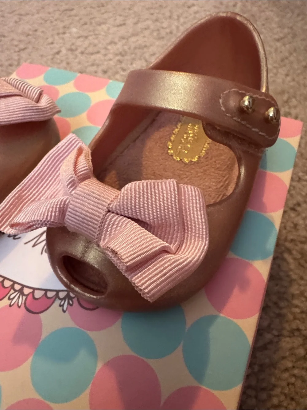 Mini Melissa Metallic Rose Gold Mary Janes with Pink Fabric Bows. Used w/box